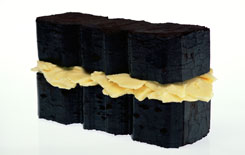 Sean Lynch, Reconstruction of Irish Energies, peat briquettes, butter,original made by Joseph Beuys in 1974 and subsequently exhibited in Rosc '77, Dublin