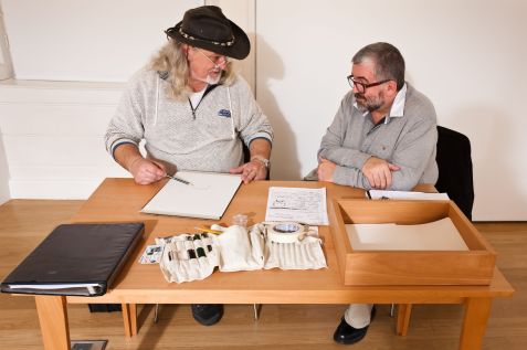 Rivane Neuenschwander, First Love, 2005, Pencil on paper, police sketch artist, table and chairs , 29 x 21 cm each, Installation view Irish Museum of Modern Art, Courtesy Inhotim Collection, Minas Gerais, Brazil, Photo © Denis Mortell