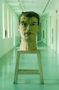 Stephan Balkenhol, Large Head, 1991, Wawa wood, 120 cm high, Base 100 cm high, Purchase, Collection Irish Museum of Modern Art	