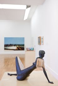 Installation shot of What happens next is a secret, (left- right) Oliver Comerford, Out Here III, Brian O’Doherty, In the Wake (of), Kathy Prendergast, Lost, Jack Butler Yeats, The Folded Heart, Peter Sedgley, Light Rhythms, (foreground) F.E. McWilliam, Girl Waiting