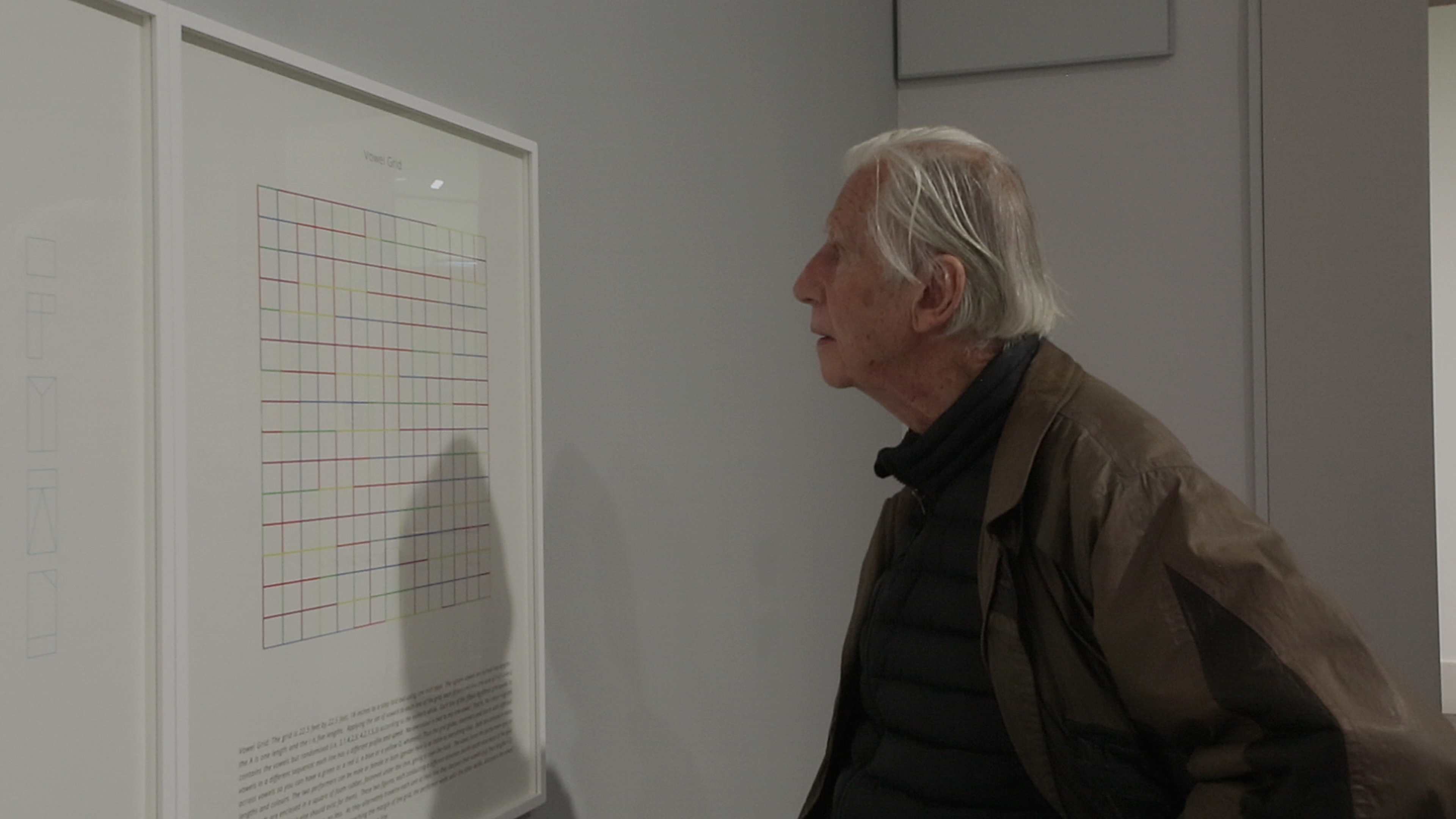 Brian O’Doherty viewing his Structural Plays series, produced in association with Stoney Road Press, during the launch of IMMA Collection: Brian O’Doherty Language and Space, Thursday 26th April 2018 Vowel Grid (2018), archival pigment print On loan Stoney Road Press Photography AlanJames Burns