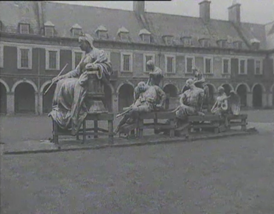 Queen Victoria with figures from her plinth at the Royal Hospital Kilmainham