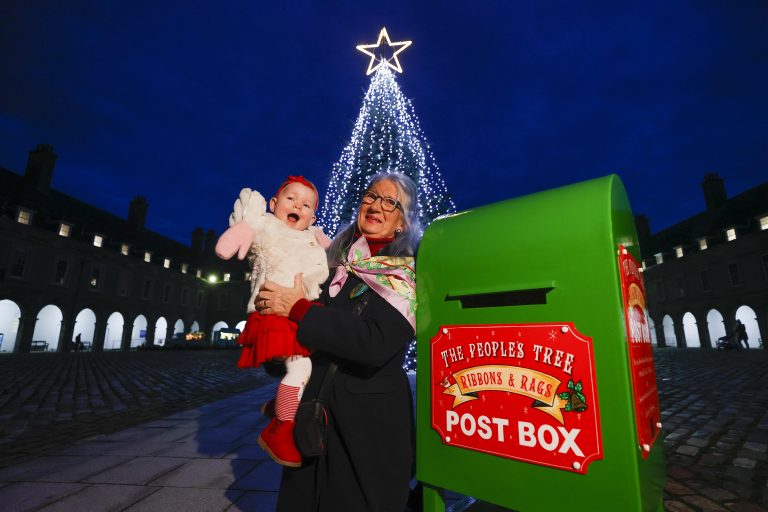 Gallery thumbnail. The People’s Tree, pictured at the Irish Museum of Modern Art is Bernadette and Lisa Murphy with Penny Murphy, 17 months, from Inchicore posting their wishes on ribbons that will be tied to the impressive 35ft Christmas tree located in the courtyard