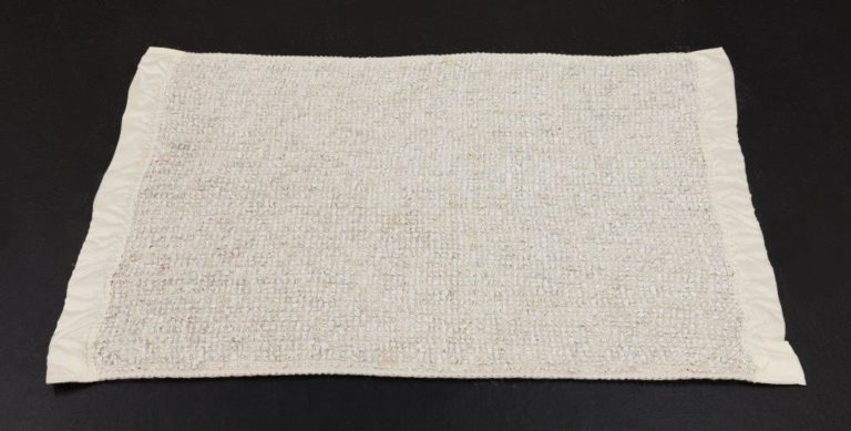 Gallery thumbnail. Kathy Prendergast, Grave Blanket (Version 1), 1997, Woollen blanket and marble chippings, Unframed, 108 x 71 cm, Collection Irish Museum of Modern Art, Heritage Gift, Kerlin Gallery Collection, 2018