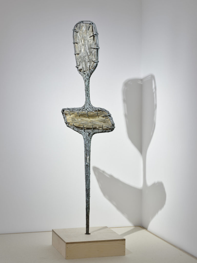 Gallery thumbnail. Hilary Heron, Vicolith II, 1963, Brass, stone, Object size, 155 x 43 cm, Collection Irish Museum of Modern Art, Heritage Gift by Mr. Noel Smyth, 2003